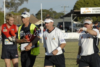 United Manager Carroll & Umpires