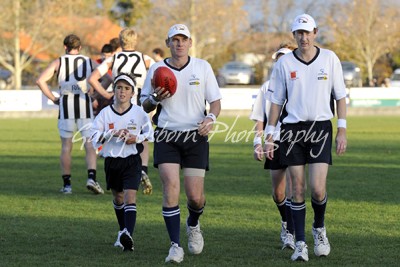 Umpire - Centrals. Hosie & Ebbott with Caia